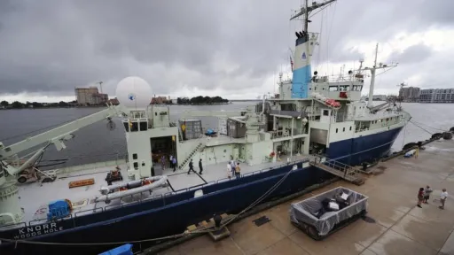 A marine research vessel docked in harbour